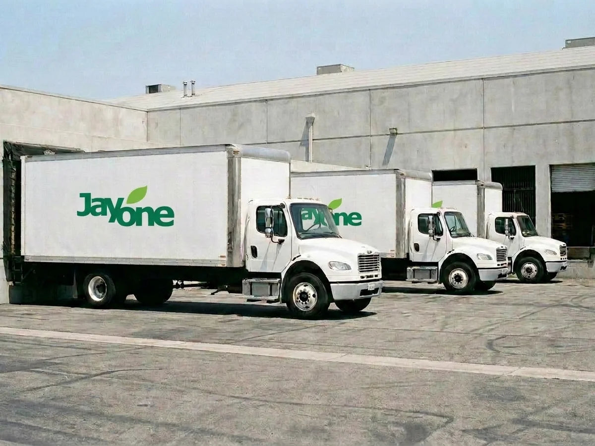 Jayone delivery trucks parked at the distribution warehouse