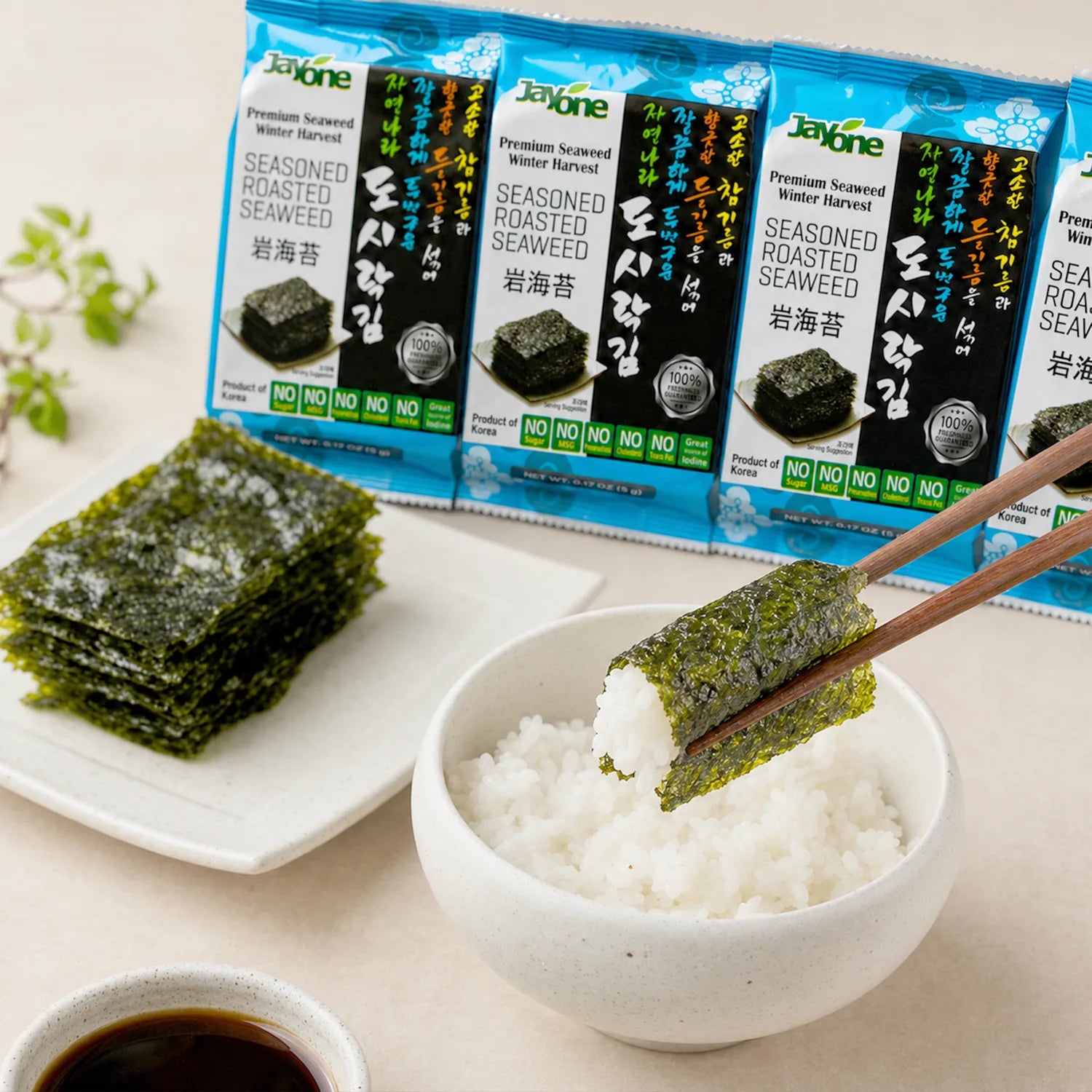 Jayone Seasoned Roasted Seaweed packs with a bowl of steamed rice and dipping sauce
